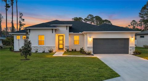 Photo of 55 Beckner Lane, Palm Coast, FL 32137 (MLS # FC315589)
