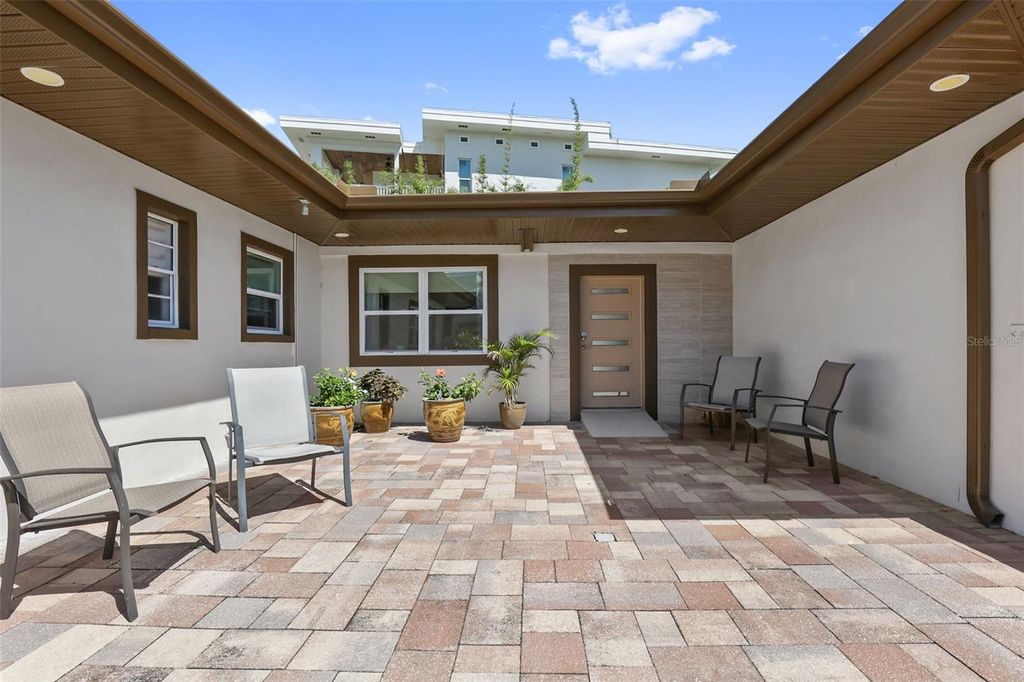 Photo of 25 Sandpiper Road, Tampa, FL 33609 (MLS # TB8497803)