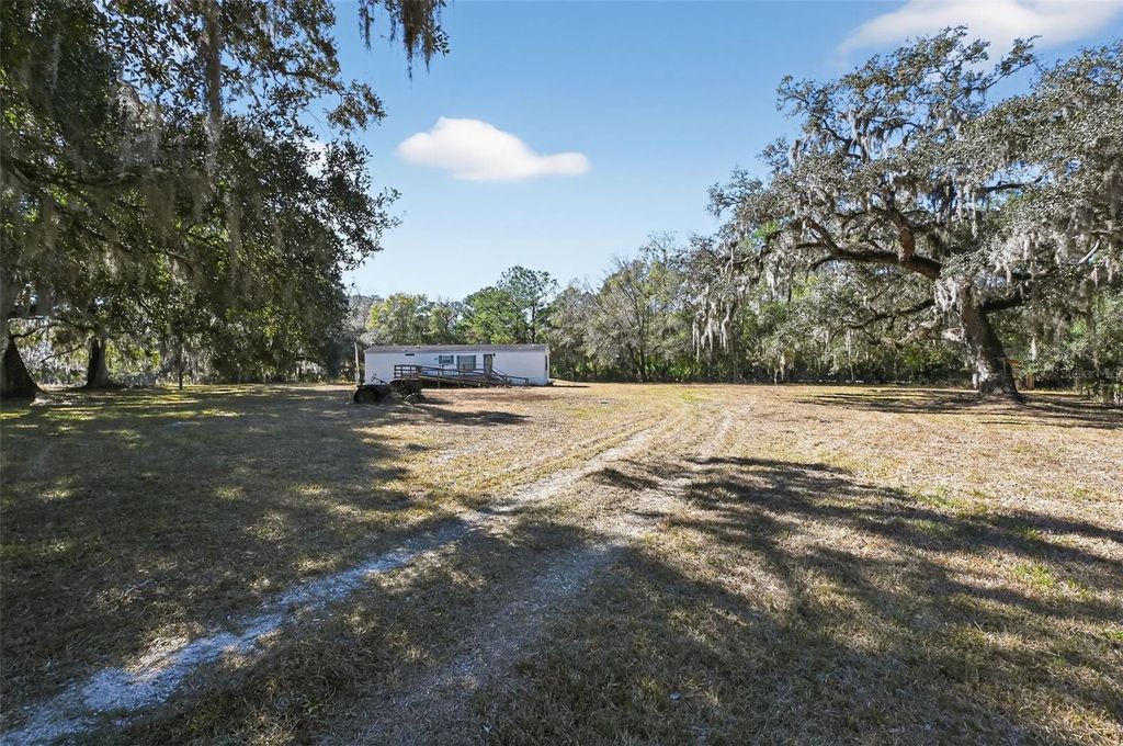 Photo of 7405 Bonnie Lake Road, Brooksville, FL 34601 (MLS # O6375679)