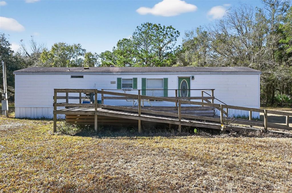 Photo of 7405 Bonnie Lake Road, Brooksville, FL 34601 (MLS # O6375679)