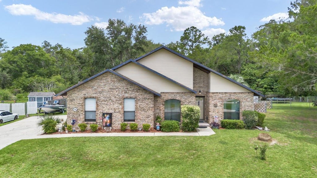 Photo of 5940 SE 37th Avenue, Ocala, FL 34480 (MLS # A4696232)