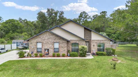Photo of 5940 SE 37th Avenue, Ocala, FL 34480 (MLS # A4696232)