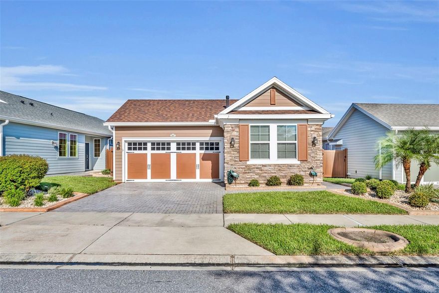 One or more photo(s) has been virtually staged. Welcome to Trilogy at the Cascades of Groveland, one of Central Florida’s premier 55+ gated communities where resort-style amenities meet small-town charm. This beautifully maintained rear fenced 2-bedroom, 2-bathroom, with office 1,568 sq ft home built in 2020 offers modern design, open-concept living, and luxury finishes throughout.
Step inside to discover upgraded flooring, granite countertops, and designer cabinetry that elevate the kitchen’s appeal. The open layout connects the kitchen, dining, and living areas seamlessly, perfect for entertaining friends or enjoying quiet evenings at home.
The spacious primary suite offers comfort and privacy with a large walk-in closet and an elegant ensuite bathroom. The split floor plan offers a second bedroom and bath, along with a  home office for those needing the work space.
Outside, the perfect setting with a covered rear porch and a nicely designed side patio area perfect for entertaining, all within a tastefully privacy-fenced backyard.
Outside, enjoy the best of Florida living in this golf cart-friendly community with world-class amenities — including a resort-style pool, full-service restaurant, fitness center, tennis and pickleball courts, indoor walking track, and countless social clubs and activities.
Located just minutes from the Florida Turnpike, you’ll have easy access to downtown Clermont and Winter Garden for shopping, dining, and entertainment, all while being surrounded by rolling hills and scenic lake views unique to Lake County.
Whether you’re looking for a full-time residence or a seasonal escape, this home delivers comfort, community, and convenience in one of Florida’s most desirable 55+ destinations.