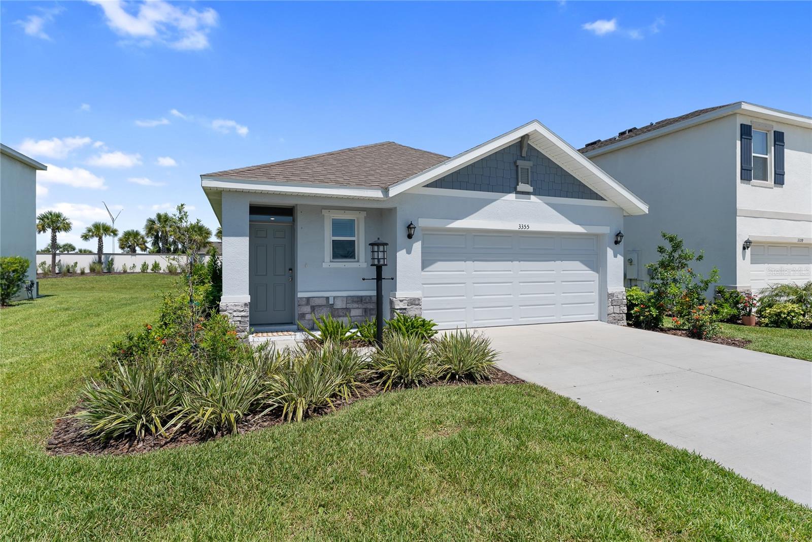 One or more photo(s) has been virtually staged. **Seller is offering $3,000 in concessions towards closing costs or rate buy-downs at full ask** Welcome to this beautifully upgraded 3-bedroom, 2-bathroom home in the highly sought-after community of Star Farms at Lakewood Ranch! Every inch of this home has been thoughtfully enhanced with custom touches that truly set it apart. From the moment you step inside, you’ll notice the elevated finishes—crown molding, wide baseboards, and framed windows add elegance throughout. The foyer welcomes you with a stylish accent wall, setting the tone for what’s to come. The kitchen is a dream, featuring a designer backsplash, soft-close cabinetry and drawers, under-cabinet accent lighting, a redesigned pantry with shiplap, and a built-in sink disposal for added convenience. The open dining area boasts a modern accent wall, while the living space flows seamlessly out to a covered patio with its own accent walls, perfect for relaxing or entertaining. Retreat to the primary suite where you’ll find a custom accent wall, luxury vinyl flooring, a spacious walk-in shower with upgraded tile, and a custom walk-in closet. The guest bathroom has been stylishly updated with new tile and vanity. Even the laundry room features custom shiplap detailing, tying into the home’s warm, cohesive style. Thoughtful upgrades like ceiling fans in every room and built-in storage elevate both function and design.
With the new Lake Manatee K-8 school right around the corner, Star Farms is a gated, resort-style community offering amenities like a pool, fitness center, pickleball and tennis courts, walking trails, dog parks, and a clubhouse with activities for all ages.
Don't miss your chance to own this upgraded gem in one of Lakewood Ranch's most vibrant communities!