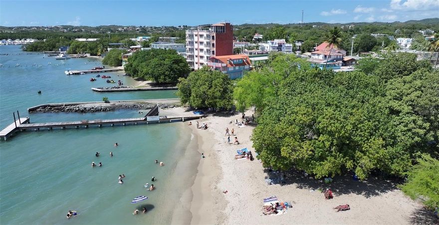 Exclusive Opportunity in the Heart of Boquerón, Cabo Rojo – Monik Building

Discover a rare gem in Boquerón’s most iconic and walkable sector. The Monik Building is a five-story concrete structure designed with unmatched engineering integrity—built on a floating foundation with 78 deep-set pilings, this property has withstood hurricanes, earthquakes, and the test of time. Appraised at $2,854,000, it is now listed below market value, offering a strategic opportunity for the visionary investor.

Each of the 5 residential units features 3 bedrooms, 2 bathrooms, living room, dining room, kitchen, laundry, hallways, and balconies with spectacular front-facing views of Boquerón Bay. Additional amenities include an elevator, stairs, rooftop with panoramic 360° views, and separate water/electric meters (6 each), allowing future conversion into a condo regime.

Currently underutilized, this is not a passive-income property—it’s a diamond in the rough. Its full potential lies in transformation: think boutique hotel, luxury short-term rentals, or a culinary destination with bar/restaurant facilities on the first level. With limited permitting for new developments in this historic area, the Monik Building represents one of the last opportunities to own a legacy structure in this high-demand tourism corridor.

Lot Size: 258 square meters
Parking: Accommodates 5 small cars
Tax ID: 380-013-008-03-001
Coordinates: 18.024408, -67.173055
This is a unique investment opportunity in the most coveted location of Boquerón. Showings are by appointment only, and proof of funds is required. Don’t miss your chance to own this beachfront treasure.

Gross Living ( 5 units / 1,176 each ) = 5,880 sq ft 
Total Building Construction is Approx = 11,172 sq ft

At this moment is vacant, but you can make passive income from it. 

Asking Price: $2.4 million

For more information or to schedule a private tour, contact us today.
