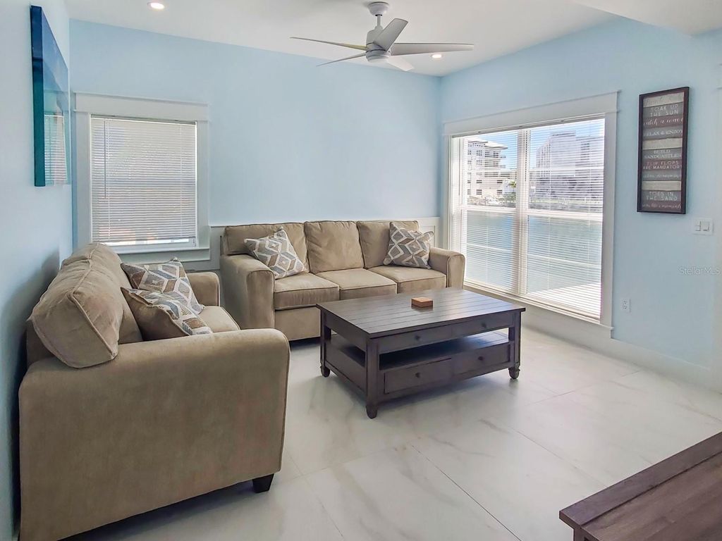 Photo of 215 Medallion Boulevard #G, Madeira Beach, FL 33708 (MLS # O6407839)