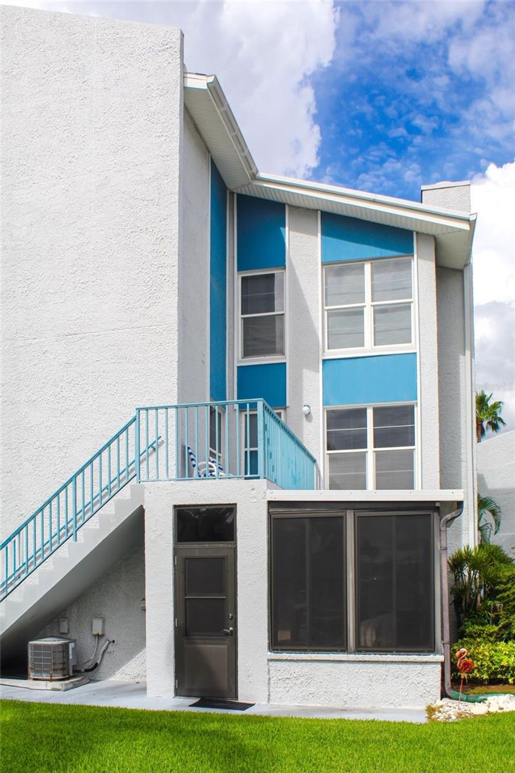 Photo of 215 Medallion Boulevard #G, Madeira Beach, FL 33708 (MLS # O6407839)