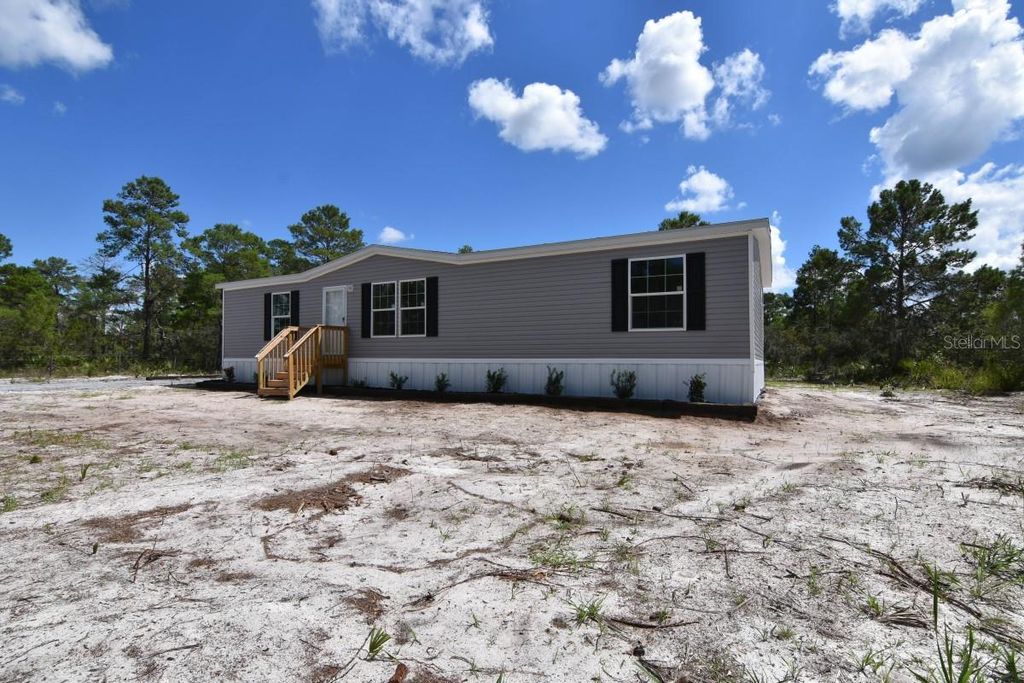 Photo of 192 Freedom Drive, Frostproof, FL 33843 (MLS # A4665936)