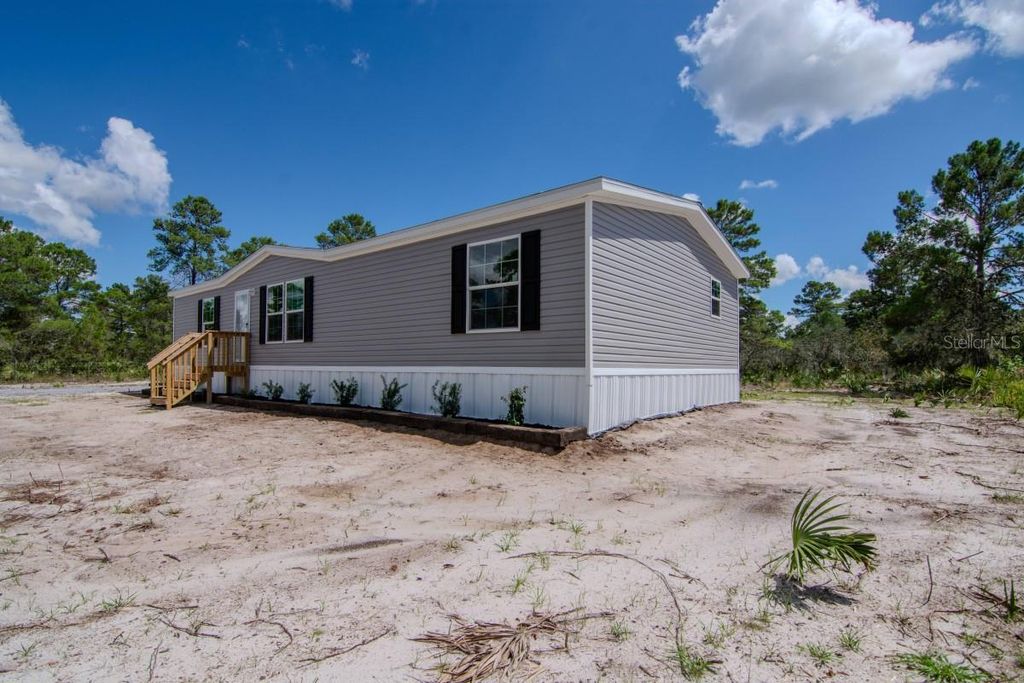 Photo of 192 Freedom Drive, Frostproof, FL 33843 (MLS # A4665936)