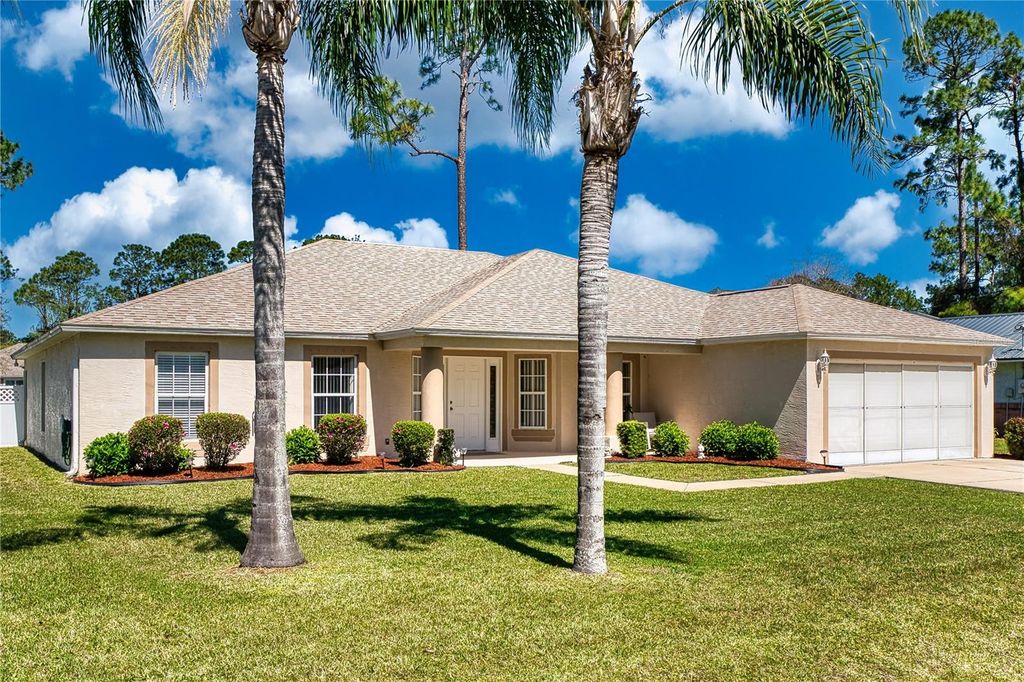 Photo of 20 Burning Wick Place, Palm Coast, FL 32137 (MLS # FC316160)