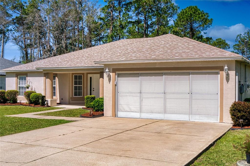 Photo of 20 Burning Wick Place, Palm Coast, FL 32137 (MLS # FC316160)