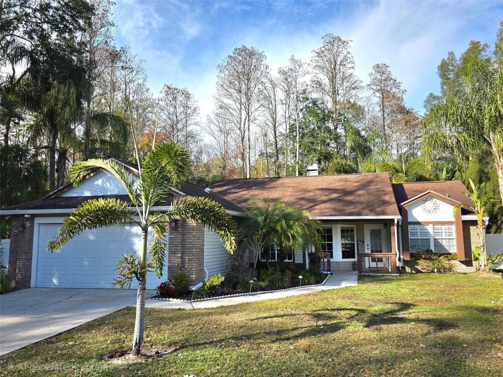 Photo of 7507 Whisper Woods Court, New Port Richey, FL 34655 (MLS # O6370419)