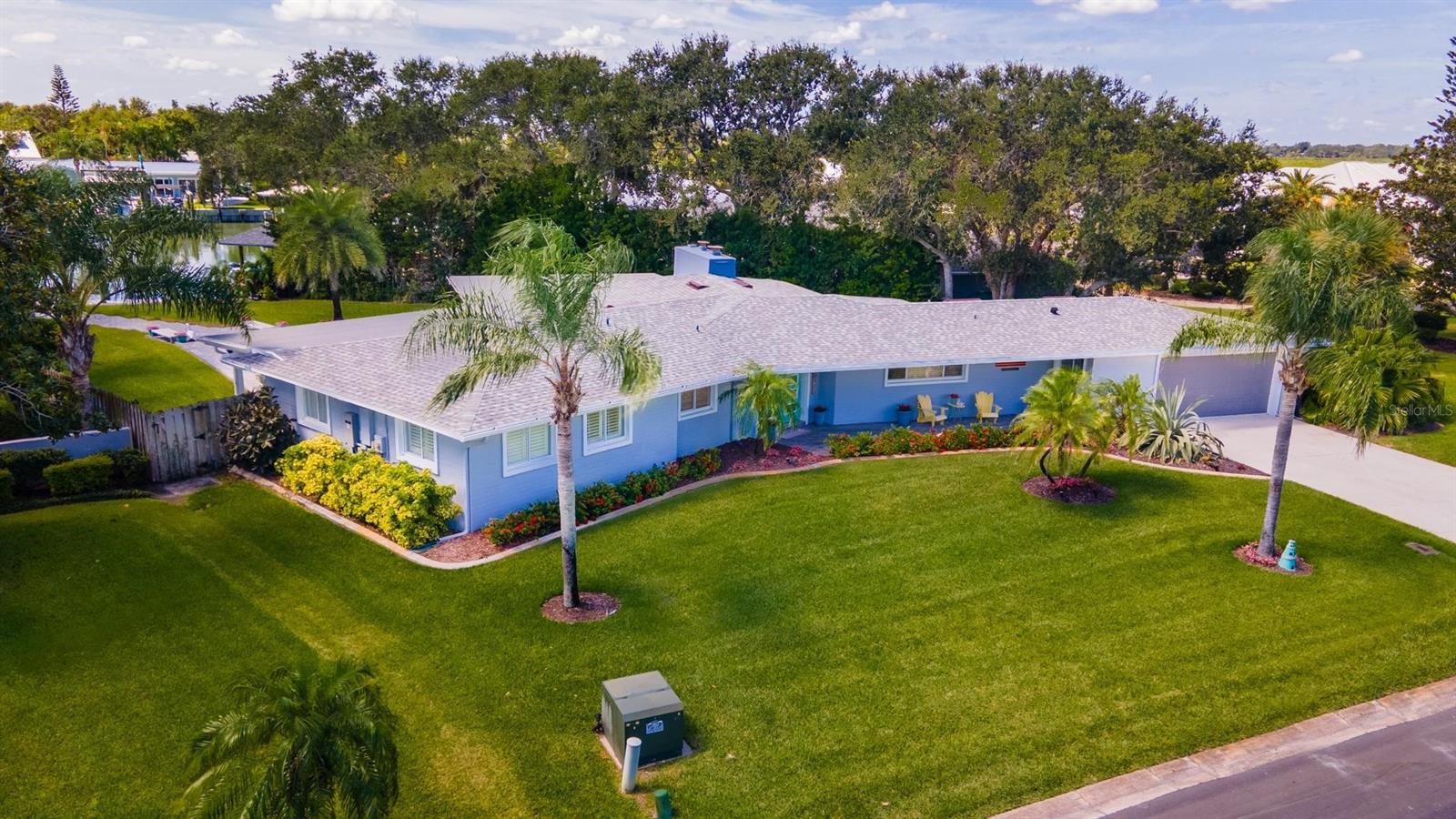 NSB WATERFRONT! OWNER FINANCING AVAILABLE! This highly desirable waterfront home located on the corner of Quay Assisi and Via Capri. Generous open floor plan centers around the main living, kitchen, and dining with panoramic view of the exceptionally maintained property, pool area, boat dock and Venezia canal. This home is ideally positioned for beautiful natural light through the day and has been extensively updated throughout, and includes stainless steel appliances, new fixtures and flooring throughout the tastefully done interior spaces. Your backyard oasis is private, with a paver walkway down to your boats with covered 10,000 pound lift, jet ski/kayak floating dock. After a day on the water come home and jump into the pool (heated) and entertain on the covered lanai with friends and guests. Located in the sought after Venezia subdivision, this updated modern feeling home has an open floor plan with generous amounts of glass and light, and is waiting for YOU!
FEATURES include: New A/C (2021), New Roof (12/2022), Pool refinish - granite, tile, pavers - with New Heater (2020). 330 square foot dock with covered 10,000 pound boat lift (2019), New AC unit (2021), New Hot Water Heater (2019), New Generac Generator (2019).
LOCATION: Just minutes to the intracoastal waterways and Disappearing Island. Walk or ride your golf cart to all the art shows, parades, holiday events, fishing tournaments, surfing tournaments, biking, walking, running events, cook offs, and so, so much more are held on Canal Street and Flagler Avenue... and YOUR boat is IN the water - say goodbye to weekends at the boat ramp!
** All information deemed accurate **