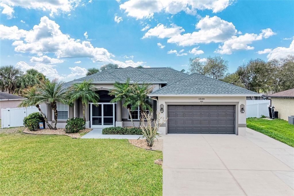 Photo of 1599 N Lavina Street, North Port, FL 34286 (MLS # C7523533)