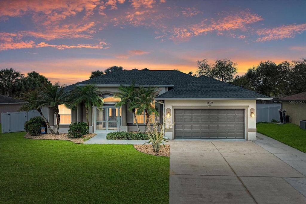 Photo of 1599 N Lavina Street, North Port, FL 34286 (MLS # C7523533)