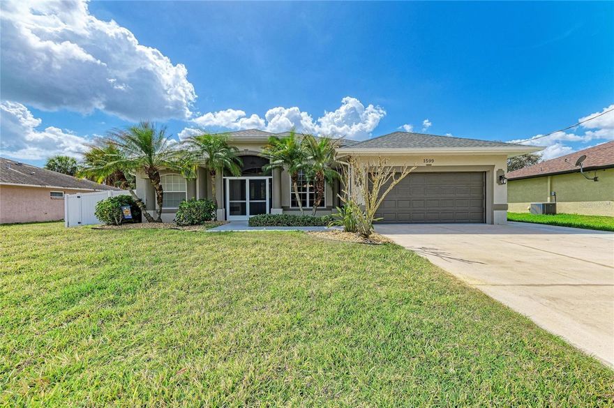 Completely upgraded and perfectly maintained by the original owner, this exceptional home offers quality, comfort, and true pride of ownership throughout. NO HOA FEES & NO FLOOD REQUIRED! CLICK ON THE VIRTUAL TOUR LINK 1 FOR THE VIDEO AND VIRTUAL LINK.
Featuring new granite countertops, elegant crown molding throughout, and new vinyl flooring, the home has been freshly painted both inside and out for a modern, move-in-ready feel. 
All bedrooms include walk-in closets (note: build in shelving in Bedroom 2 does not convey). Major updates include a new roof (2023), rescreened pool cage (2023), and a new pool heater (2022). The home is also equipped with an under-sink reverse osmosis system, whole-house water softener, and gutters surrounding the property.
Enjoy an extended driveway, beautiful landscaping, and added storm protection with hurricane shutters for all windows plus extra protection for the garage. The garage can be freshly painted (walls and floors) prior to closing upon buyers request.
Step outside to your private backyard oasis featuring a stunning free form pool , accessible from all bedrooms—creating a unique indoor-outdoor living experience. The backyard offers exceptional privacy, perfect for relaxing or entertaining.

An ADDITIONAL BONUS: the parcel directly behind the home is owned by the seller and is available for purchase under separate negotiated terms, offering a rare opportunity to expand your property. There is plenty of room to expand — whether you envision a garden, additional outdoor living space, or a custom backyard oasis. 

Conveniently located near I-75, US-41, and State Road 776, with easy access to shopping, dining, and everyday conveniences—and just a short 25-minute drive to beautiful Gulf beaches.
Schedule your private showing today—this one truly stands out!