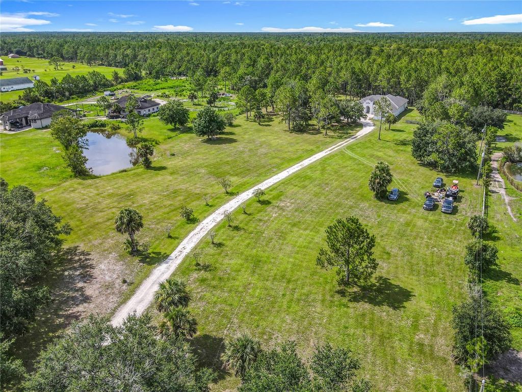 Photo of 389 Equestrians Way, New Smyrna Beach, FL 32168 (MLS # NS1085575)