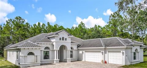 Photo of 389 Equestrians Way, New Smyrna Beach, FL 32168 (MLS # NS1085575)