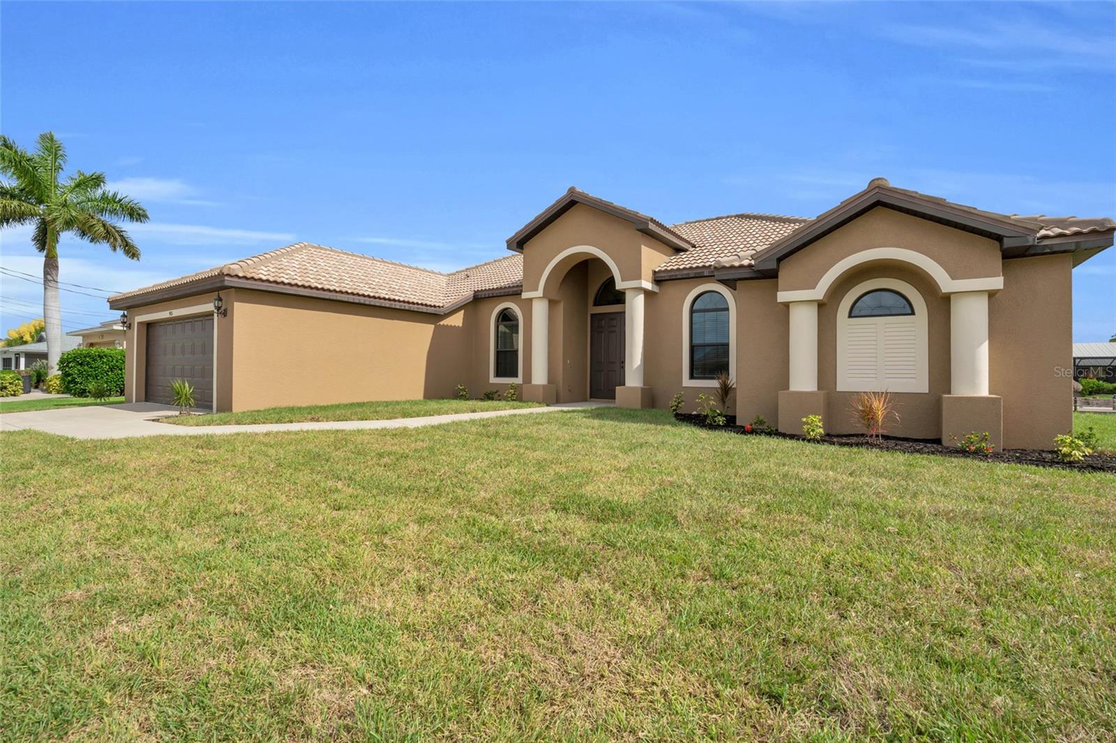 The flood policy is transferable instead of 1-year flood policy paid. Discover the beauty of Gulf Coast living in this beautiful Gulf Access home nestled in the heart of southeast Cape Coral. This three-bedroom, two-and-a-half-bathroom residence that includes a den, beckons you to embrace the ultimate Florida lifestyle. As you step inside, you'll be greeted by an open and inviting floor plan that seamlessly blends the living, dining, and kitchen areas, creating a harmonious flow of space. Beyond the expansive windows, your own private oasis awaits – a stunning lanai overlooking the serene Gulf Access canal. Imagine lazy afternoons spent lounging by the pool, taking in the tranquil waterfront views, or embarking on a leisurely boat ride to the river, just a short journey away. The well-appointed owner's suite offers a personal sanctuary, complemented by two additional guest rooms and a full bathroom, ensuring ample space for family and friends. Step out onto the screened lanai and immerse yourself in the natural beauty that surrounds you, a perfect setting for al fresco dining, entertaining, or simply unwinding after a day of coastal adventures. In this idyllic Cape Coral haven, you'll find yourself at the intersection of comfort, convenience, and beauty. Embrace the epitome of Gulf Coast living and create lasting memories in this exceptional waterfront home.