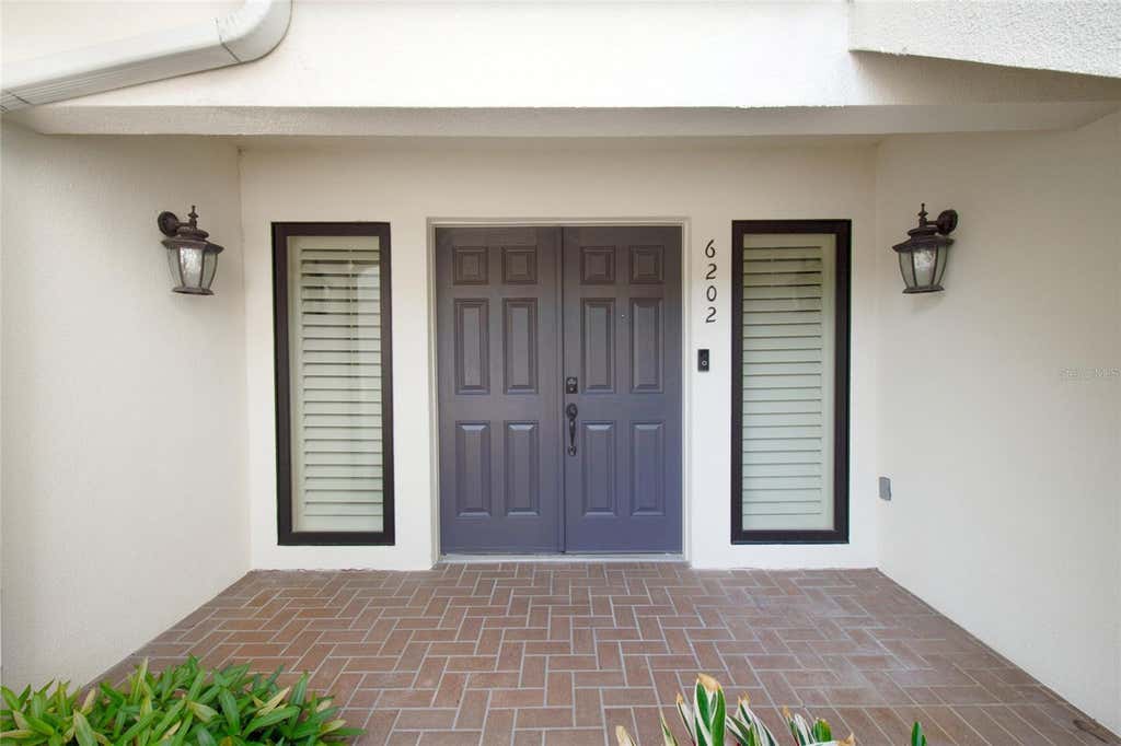 Photo of 6202 Masters Boulevard #102, Orlando, FL 32819 (MLS # O6426878)