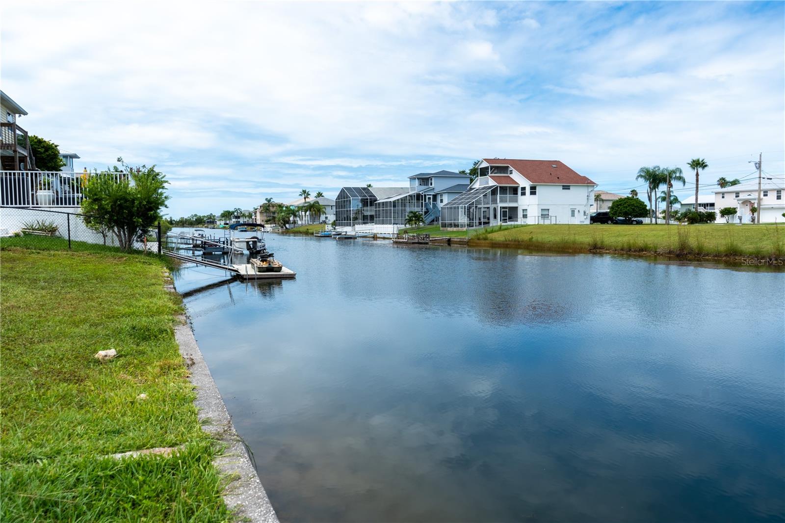 Imagine being tucked away in the serenity of Hernando Beach South; you hear the water in the canal behind you, and the birds are singing. You are enjoying the peace and quiet in your brand new, custom home.
This lot is ready to become a coastal lover's dream home. With 75 feet of water frontage, this lot is one of the few in Hernando Beach South that offers the convenience of not having to build a new and expensive, concrete seawall. The lot is ready for permits to be pulled and building to begin! Polo Builders, INC. is a luxury, custom home builder who builds throughout Hernando Beach South. They are recommended for building on the lot, however, it is not required. Make this piece of paradise yours today!