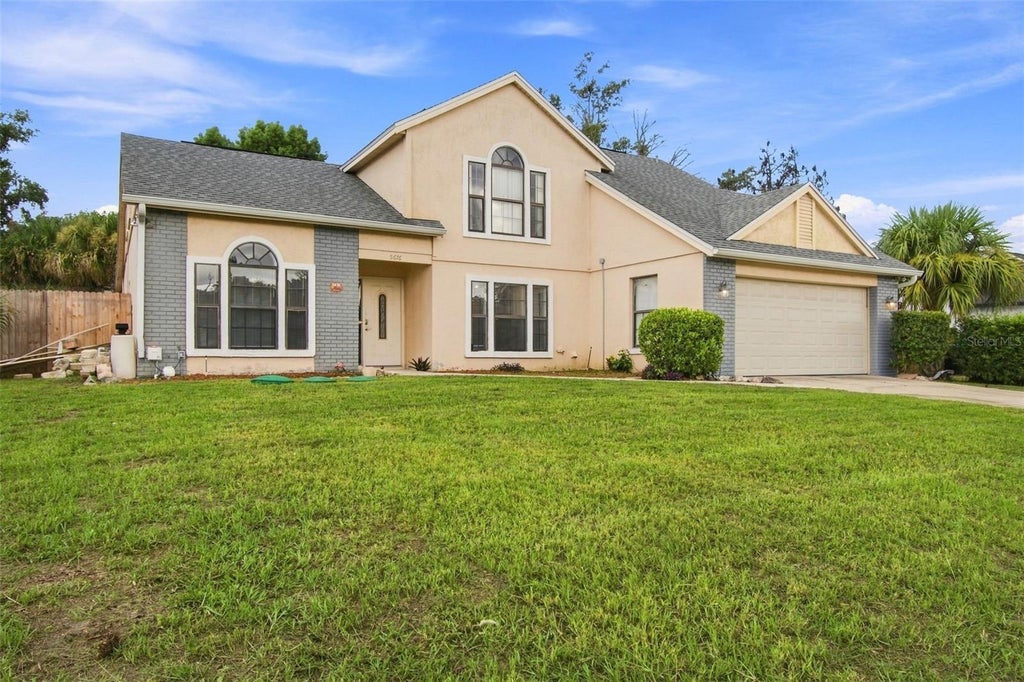 Photo of 5676 Breckenridge Circle, Orlando, FL 32818 (MLS # O6441324)