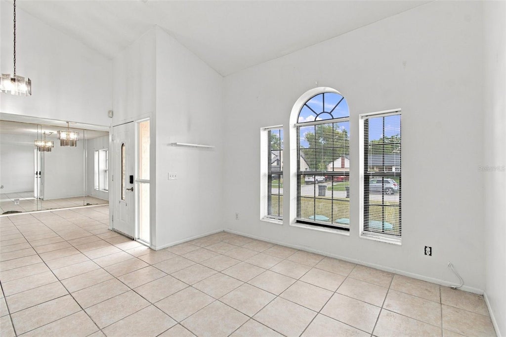 Photo of 5676 Breckenridge Circle, Orlando, FL 32818 (MLS # O6441324)