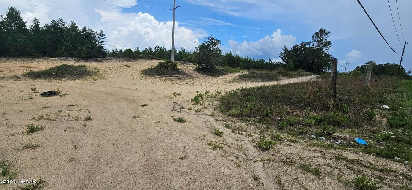Escape to the peaceful charm of Hoot Owl Ridge in St. Johns Riverside Estates. This affordable 0.24-acre lot offers a perfect blend of quiet rural living and nearby conveniences. Just minutes from the St. Johns River public boat ramp and close to Murphy Creek Conservation and Dunn's Creek State Park—ideal for hiking, canoeing, and wildlife watching. Enjoy small-town living with restaurants nearby and Crescent Beach only 45 minutes away. Build your dream home or invest in Florida land!