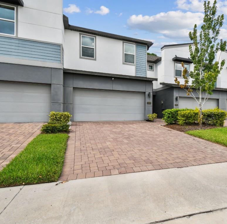 Built in 2020, this 3-bedroom, 2.5-bath townhome combines style, functionality, and low-maintenance living and is ready for you to move right in.
It features a paver driveway and walkway framed by lush landscaping. As you step inside the home, you will find a versatile flex space, which is perfect as a home office, or additional living room.
The main level boasts soaring 9+ foot ceilings. The open-concept layout seamlessly connects the living room, dining area, and chef-inspired kitchen, which is ideal for entertaining or everyday living. The kitchen features sleek quartz countertops, shaker-style cabinetry, and a spacious island with bar seating. Sliding glass doors open to your fully screened-in patio, a serene spot to enjoy your morning coffee or evening wine.
Upstairs, a generous loft offers additional living space for a second family room, play area, or workspace. The expansive 23' x 14' primary suite feels like a true retreat with tray ceilings, a spa-like en-suite bath with dual quartz vanities, a walk-in shower, a private water closet, and a large walk-in closet. Two additional bedrooms, each with ceiling fans and walk-in closets, share a beautifully appointed full bathroom. The conveniently located upstairs laundry room includes a washer and dryer.
Hawks Crest is a gated community offering resort-style amenities: a sparkling pool, playground, parks, picnic areas, and more. Low HOA fees cover cable, internet, landscaping, pool, gated entrance, playground, common areas, and exterior building and roof insurance.
Ideally situated just a short walk from the new Park Maitland Preschool and minutes from Trinity Prep (one of Central Florida’s premier private schools) you’ll also enjoy quick access to local favorites like Foxtail Coffee, Kelly’s Homemade Ice Cream, and The Ravenous Pig. Downtown Winter Park is only 10 minutes away, with easy access to major highways for commuting.
Don’t miss this opportunity to own a thoughtfully designed, move-in-ready home in one of Winter Park’s most desirable communities...schedule your private showing today!