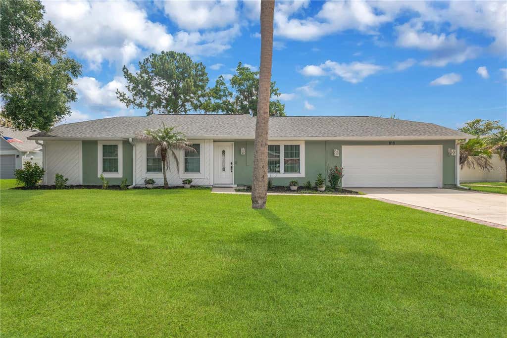 Photo of 819 Jacaranda Drive, Oldsmar, FL 34677 (MLS # TB8539896)