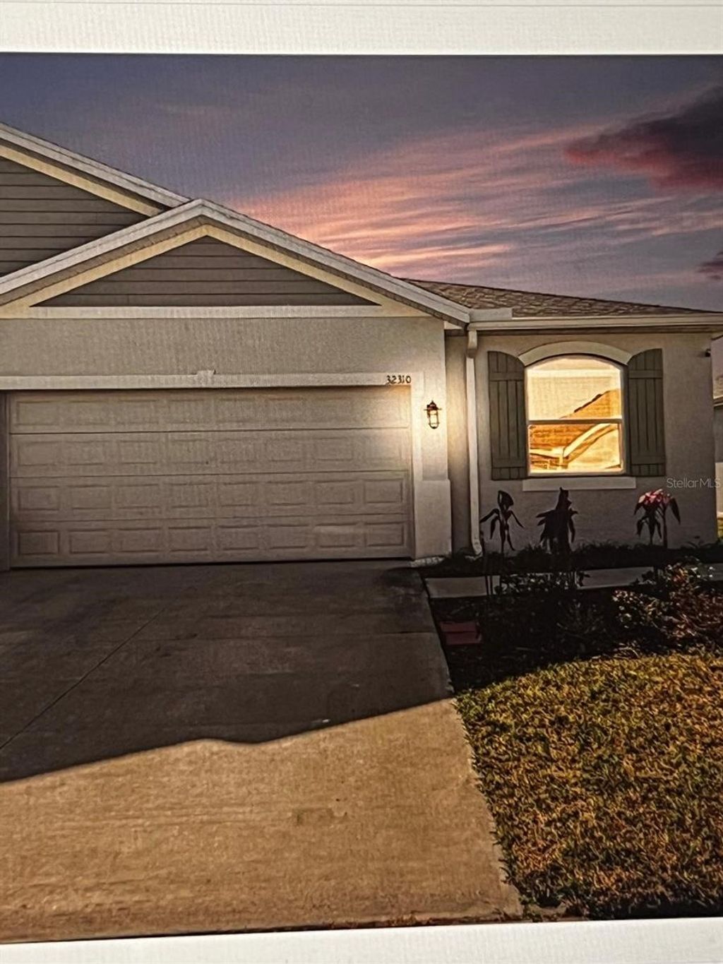 Photo of 32310 Lexington Street, Wesley Chapel, FL 33543 (MLS # TB8503834)