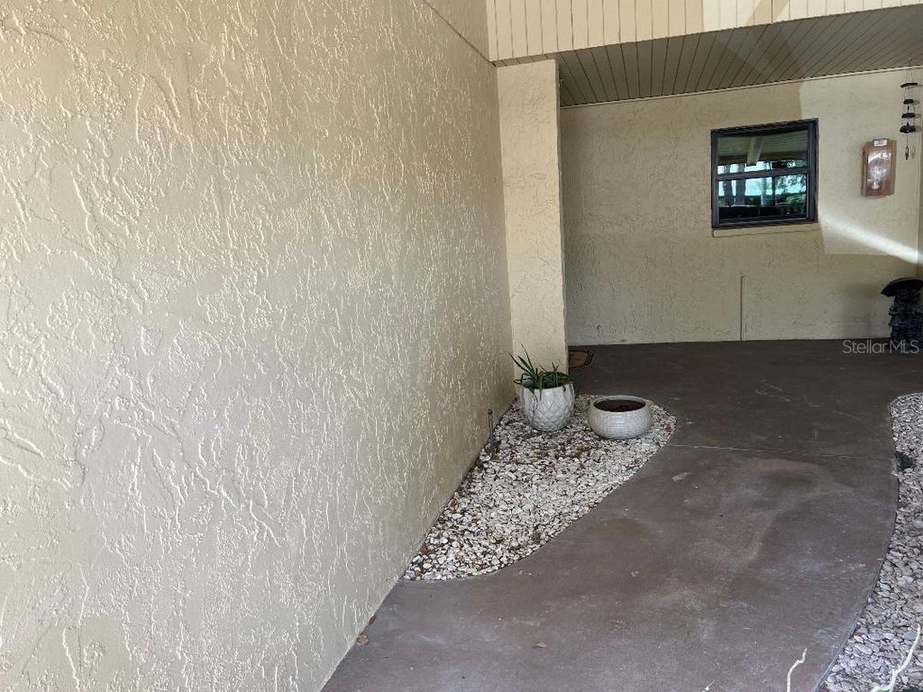 Photo of 1220 13th Circle SE, Largo, FL 33771 (MLS # TB8494879)