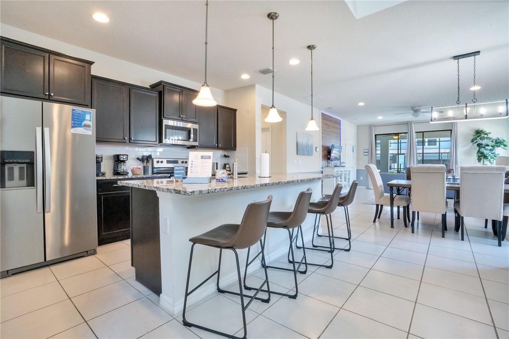 Photo of 8936 Prague Way, Kissimmee, FL 34747 (MLS # O6414964)