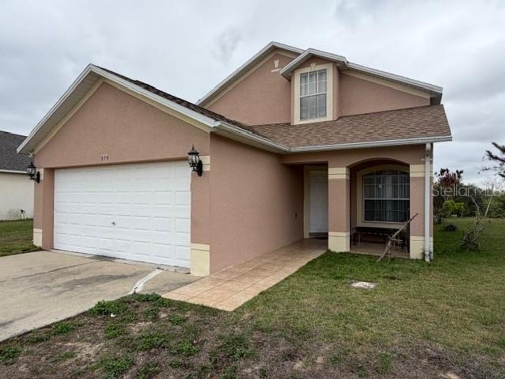 Photo of 979 Kenbar Avenue, Haines City, FL 33844 (MLS # S5146267)