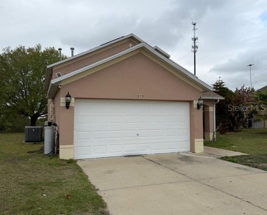 Well-maintained and updated 4 bedroom 2.5 2 story home with nice backyard. Law HOA community.  Property is centrally located to shopping and Florida major attractions.
