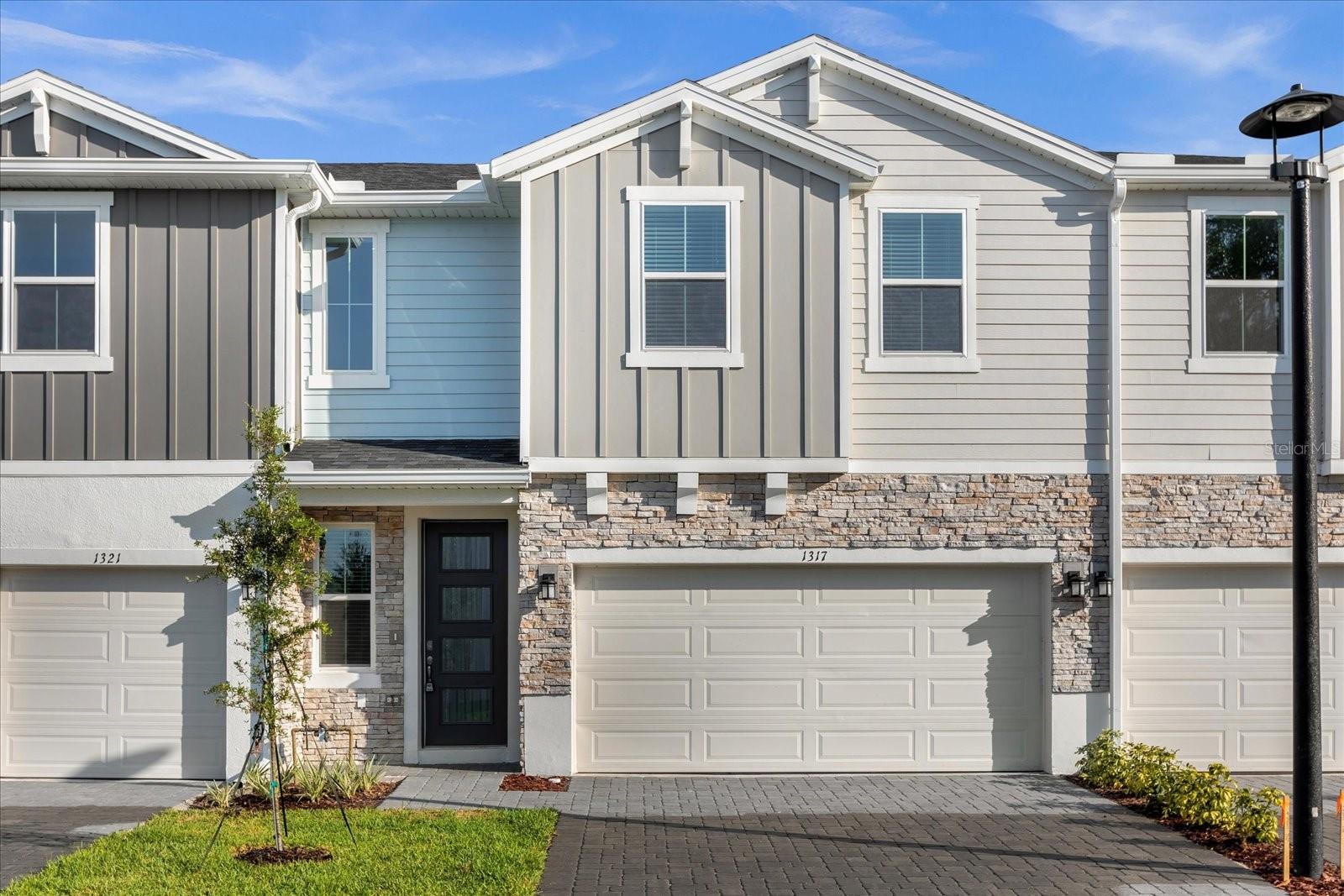 Stunning - new construction - Townhome in privately secluded and gated community of Rivers Edge. Light and bright unit with 3 beds, 2.5 bath and 2 car garage. Featuring an open floor plan with a contemporary design, energy efficient windows, a gourmet kitchen with wood cabinets, solid counter surfaces and stainless steel appliances. All bedrooms and loft area are located on the second floor and offering plenty of light and private views over the conservation area. Rivers Edge is located within minutes to shopping, entertainment and I-4. Call and schedule your private viewing today !
