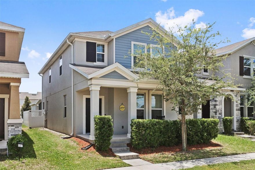 Imagine stepping onto your covered front porch on a crisp morning, surveying the tree-lined street beyond, then entering this charming bungalow where an open floor plan and abundant natural light immediately welcome you home. Updated flooring throughout main floor, neutral paint tones, and move-in ready condition invite you to settle in without delay. The open kitchen anchors the heart of daily life, featuring stone countertops, pendant lighting, a large center island, built-in pantry, custom tile backsplash, and stainless steel appliances that make cooking effortless. High ceilings and oversized closets enhance the sense of space and practicality at every turn. Tile flooring flows smoothly through the kitchen, dining area, great room, entry foyer, and bathrooms, while carpet softens the primary bedroom and bedrooms. Built-in shelving and a customer built-in drop zone provides smart storage solutions throughout. The upgraded stair railing guides you upstairs, where the convenience of upstairs laundry with washer/dryer in-unit eliminates trips between floors. Energy efficient windows frame views of the dry pond, open green space, and tree-lined surroundings—and on clear nights, Disney fireworks paint the sky in the distance. Outside, a screened lanai extends your living space into a protected retreat, while a fenced backyard with vinyl fencing offers privacy and security. The detached garage features rear-facing placement and alley access for convenience, plus remote-controlled entry and a Ring video doorbell for modern security. Central air conditioning, forced air heating, water heater, and ceiling fans ensure year-round comfort. Asphalt shingles cap the roof, completing a well-maintained exterior. This Winter Garden home sits close to Waterspring Elementary and Horizon High School, near Summerlake Park, and within reach of Walt Disney World Resort. Community pool access within a short distance rounds out the lifestyle. Schedule your showing today and discover where your next chapter begins.