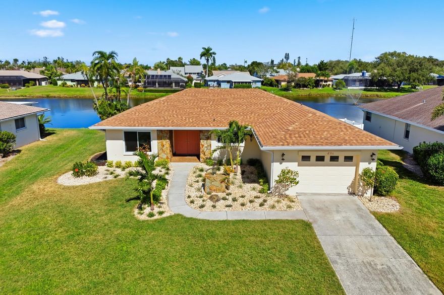 This beautifully updated two-bedroom, two-bathroom home is located in the desirable Bay Lake Estates neighborhood—just five minutes from Anna Maria Island and Florida’s stunning Gulf beaches.

The home has been completely renovated inside and out, featuring a brand-new roof and fresh exterior paint. Inside, you’ll find brand-new wood-plank porcelain tile flooring throughout, new baseboards, re-textured and painted ceilings, and freshly painted walls.

The kitchen has been fully remodeled with all-new soft-close cabinets and drawers, quartz countertops, stainless steel appliances, and a floating island with a stainless steel top. Both bathrooms have been completely updated with new valves, toilets, shower tile, and vanities. Each closet in the home includes custom modular shelving for optimal organization.

Natural light fills every room, highlighting breathtaking views of the lake out back—home to a variety of local wildlife, including bald eagles, ospreys, ibises, rails, limpkins, herons, egrets, ducks, geese, turtles, and even juvenile sharks and tarpon. Enjoy these views from the brand-new screened-in porch, the perfect place to relax and take in the tranquil surroundings.

Additional upgrades include fresh blown-in R-19 insulation, a complete A/C system clean-out for peak performance, new soffits and fascia, a whole-house gutter system, fresh landscaping, and more.

Bay Lake Estates offers convenient, maintenance-free living with community dues covering lawn care and irrigation, for the low monthly fee of $196. This move-in-ready home combines modern updates, serene water views, and proximity to Anna Maria Island’s best beaches, restaurants, shopping, and activities.