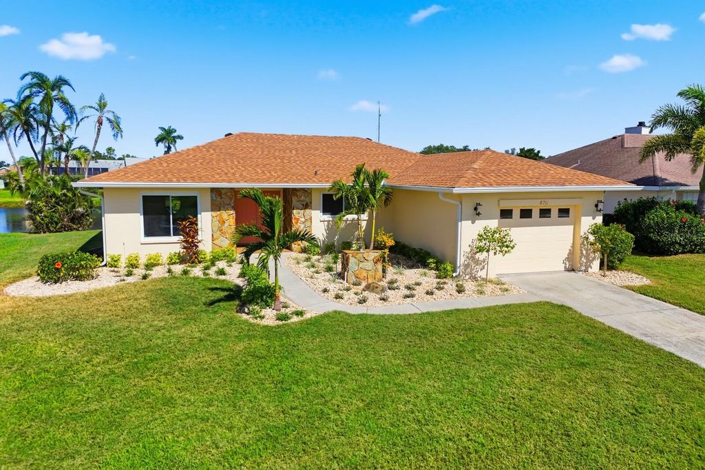 Photo of 8711 51st Avenue W, Bradenton, FL 34210 (MLS # A4669928)