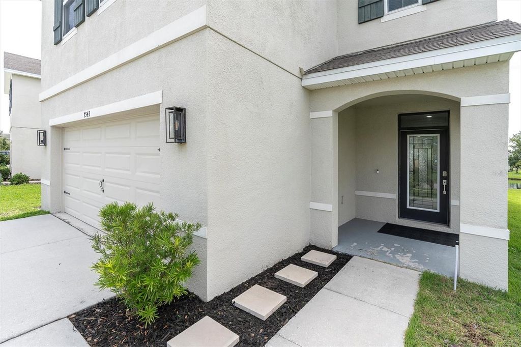 Photo of 7543 Tuscan Bay Circle, Wesley Chapel, FL 33545 (MLS # TB8477892)