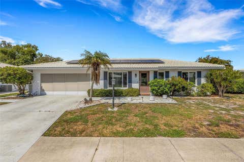 Photo of 1306 Bottlebrush Drive, Bradenton, FL 34208 (MLS # A4697008)