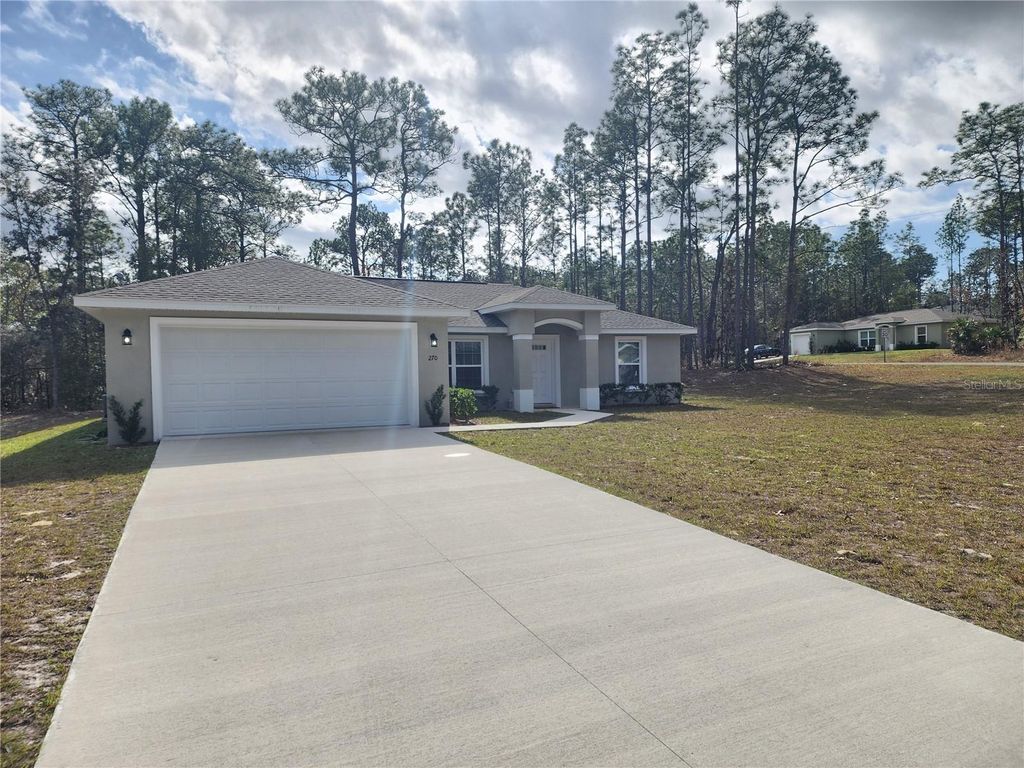 Photo of 270 W Goldcoast Place, Dunnellon, FL 34434 (MLS # O6373968)