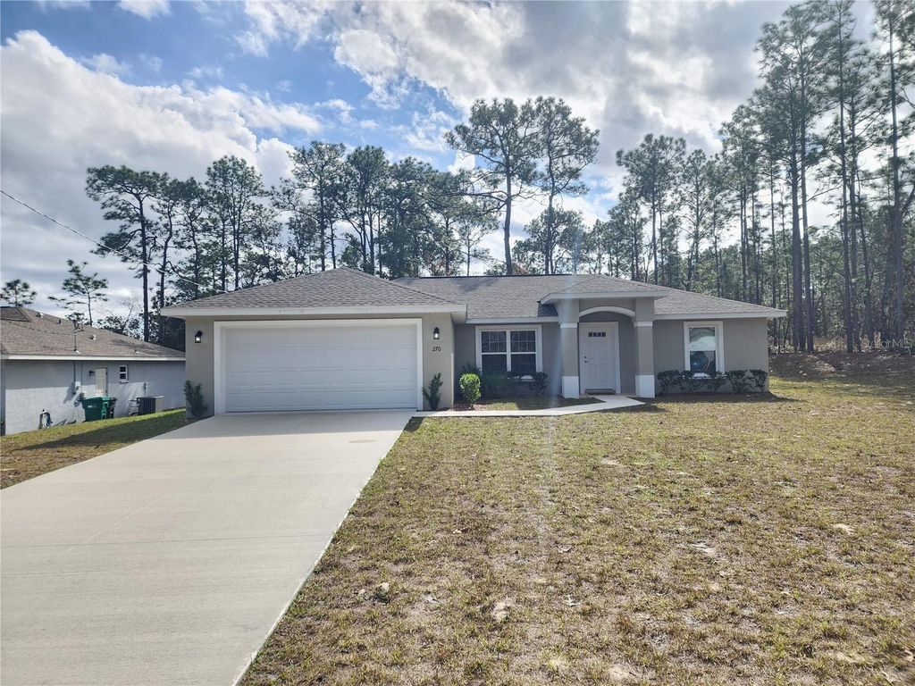 Photo of 270 W Goldcoast Place, Dunnellon, FL 34434 (MLS # O6373968)