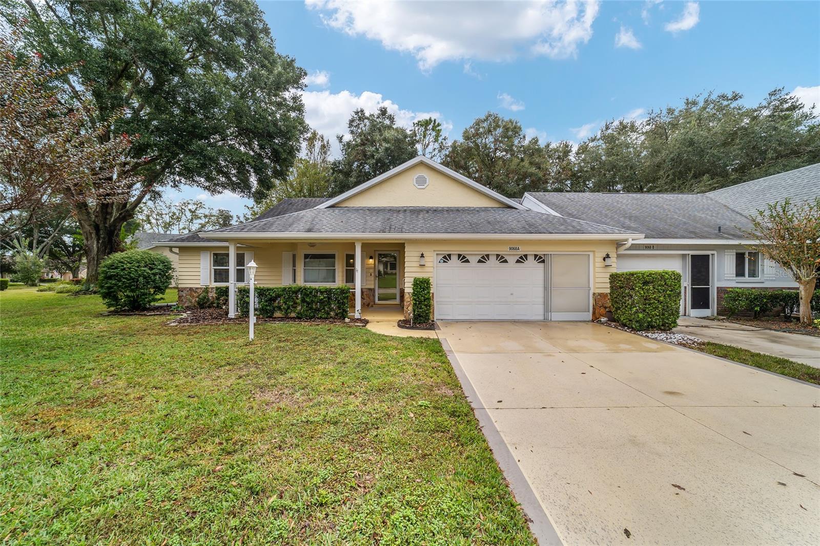 Move-In Ready Augusta Model with No Rear Neighbors – $254,900
Beautifully Renovated & Expanded Villa in On Top of the World
Welcome home to this spacious and tastefully updated Augusta model villa offering nearly 2,000 sq ft of comfortable living space—with no rear neighbors for added privacy. This move-in ready gem combines modern upgrades with a bright, open layout that’s perfect for relaxing or entertaining.
Step inside to discover a light-filled great room with cathedral ceilings, creating an inviting, airy feel throughout. The fully remodeled kitchen showcases granite countertops, stainless steel appliances, and abundant cabinetry, opening to a generous dining area and sunny Florida room where you can enjoy morning coffee or gather with friends.
A private covered patio (added in 2021) overlooks the peaceful backyard with mature landscaping—your own serene outdoor retreat. The spacious primary suite features a walk-in closet and updated en-suite bath with walk-in shower, while the split-bedroom layout ensures comfort and privacy for guests. A versatile flex room makes the ideal office, hobby space, or den.
Notable upgrades include:
Roof (2018)
HVAC (2012)
Whole-house water filtration system
Updated Florida room windows (2008)
Epoxy-coated garage floor
Mounted TVs included
Fresh interior updates throughout
Located in Ocala’s premier 55+ community, you’ll enjoy world-class amenities—indoor and outdoor pools, fitness centers, golf, pickleball, clubs, and social activities—all with golf cart access to nearby shopping, dining, and medical facilities.
This home offers the perfect blend of space, privacy, and modern comfort—a rare find in On Top of the World.
Schedule your private showing today!
