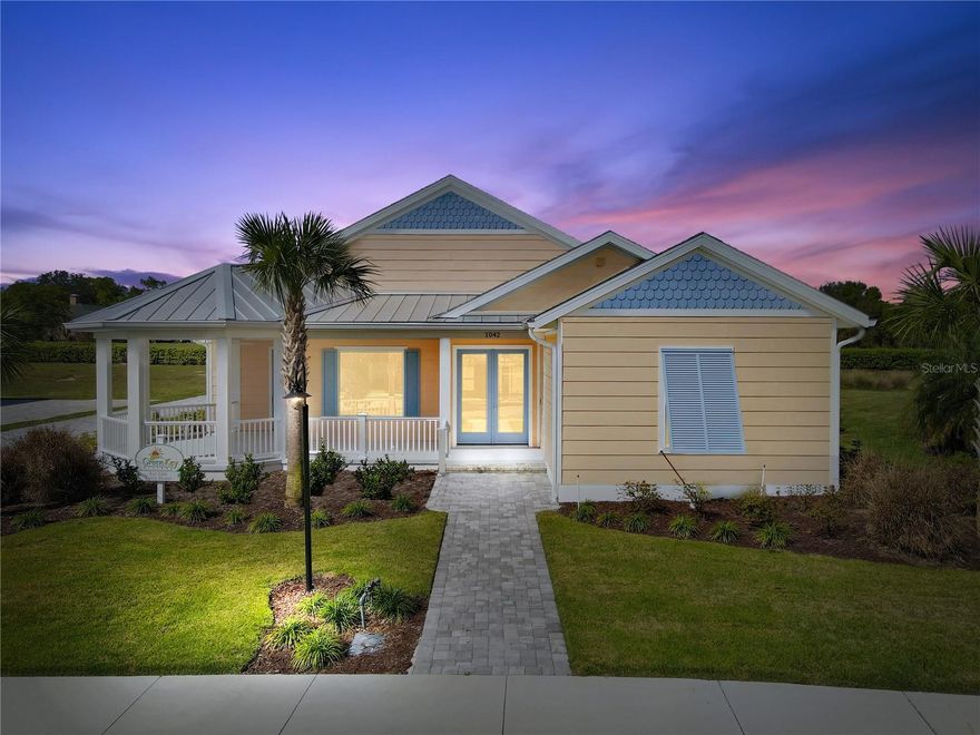 Enjoy coastal living at its best!  Just walk up to the front porch of your SOLAR POWERED home and let the Bahama shutters, bright colors, and beauty transport you to the islands!  The first thing you see is the happiest gazebo-style front porch on earth, you know this is the home where you truly belong.  Step inside the 3 bedroom, 2 bath Eaton floor plan and marvel at the magic of a living space with just as much personality and heart as you.  From the spacious kitchen and living room to the gorgeous primary suite featuring a free-standing soaking tub, every inch of this home reflects classic Florida charm.  You will love the living room cathedral ceiling highlighted by shiplap and beams.  With 3,892 total square feet of stunning wide-open space, you'll always feel like your best self when you're here.
