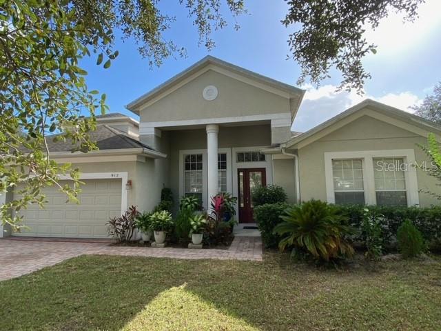 Welcome to your spacious Florida retreat! This beautiful two-story home offers 3,031 sq ft of well-designed living space, featuring 4 bedrooms and 3 full bathrooms all on the main floor—plus a versatile upstairs room with a full closet that can serve as a 5th bedroom, bonus room, or flex space to suit your lifestyle.
From the moment you arrive, you’ll be captivated by the home’s mature landscaping, charming covered entryway, and elegant leaded-glass front door. Step inside to a warm and welcoming layout that opens with a formal living and dining room, ideal for hosting special occasions.
The heart of the home is the spacious kitchen, complete with 42” wood cabinetry, a closet pantry, and a breakfast bar that flows into a cozy breakfast nook—perfect for casual meals. The kitchen overlooks a large family room, creating an open and airy space that’s perfect for both everyday living and entertaining. High ceilings and abundant natural light from large windows enhance the inviting feel of this home.
Conveniently located just off the kitchen is an indoor laundry room with washer/dryer hookups and a utility sink. The split floor plan offers privacy for the luxurious master suite, which features tray ceilings, dual walk-in closets, private access to the lanai, and a spacious en-suite bath with a soaking tub, separate shower, and dual vanities.
Need storage or workshop space? The oversized 20’x29’ 3-car garage has plenty of room for vehicles, tools, and hobbies. Come outside to the covered lanai and enjoy your private backyard oasis, complete with a variety of fruit-bearing trees—including papaya, yuca, and green pigeon peas—and a peaceful conservation area behind the home, ensuring no rear neighbors and a serene natural view.
Nestled in an established community with low HOA fees and underground utilities, this home offers the perfect blend of tranquility and convenience. Just minutes from downtown Ocoee, you'll enjoy easy access to shopping, dining, and major roadways like the Turnpike, 408, and I-4—connecting you to local attractions and Florida’s beautiful beaches.
Don’t miss your chance to call this versatile and welcoming home yours—schedule a showing today!.As part of Keller Williams' dedication to resident satisfaction, you'll have access to our exclusive Resident Benefits Package (RBP). This includes perks such as HVAC air filter delivery, renters insurance, credit-building opportunities, $1M Identity Protection, and utility concierge service, ensuring a stress-free move-in experience. Don't miss out on this exceptional opportunity!