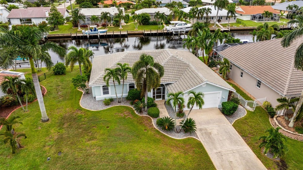 Photo of 918 Cimarron Drive, Punta Gorda, FL 33950 (MLS # A4707977)