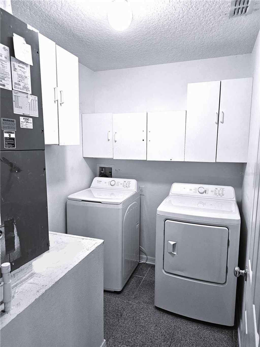 Photo of 551 Stonewall Avenue, Haines City, FL 33844 (MLS # S5147273)