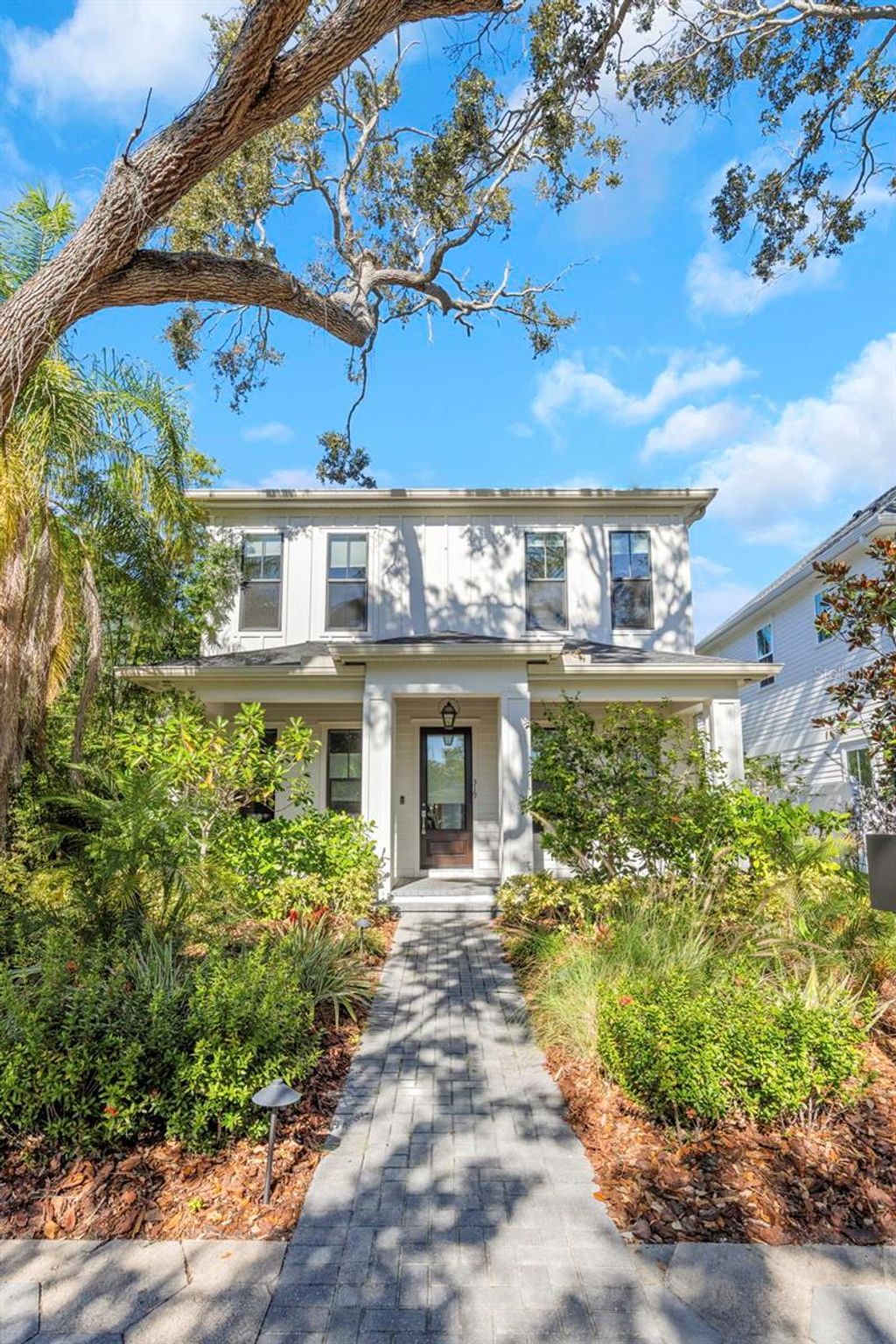 Photo of 319 12th Avenue NE, St Petersburg, FL 33701 (MLS # TB8442934)