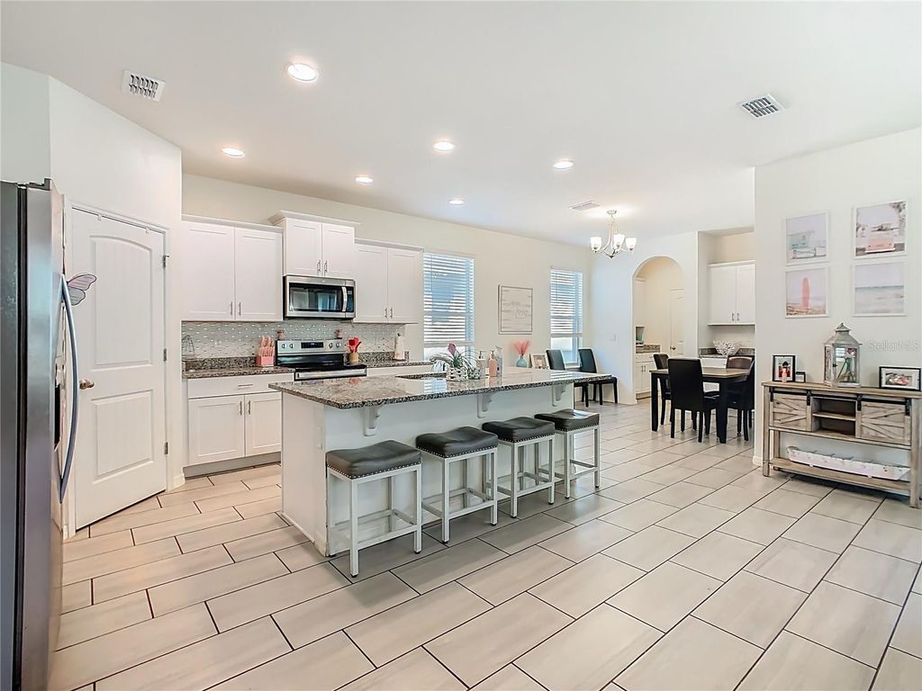 Photo of 16230 Carraway Bay Alley, Winter Garden, FL 34787 (MLS # NS1087076)